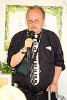 Harold Chernofsky singing at 25 Anniversary Party Montgomery Place.jpg
